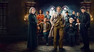 A dramatic Victorian Gothic scene featuring elegantly dressed characters in a dimly lit historic setting.