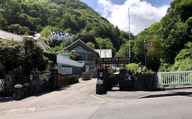 A view of the entrance to The Glen Lyn Gorge in a scenic wooded area in North Devon.