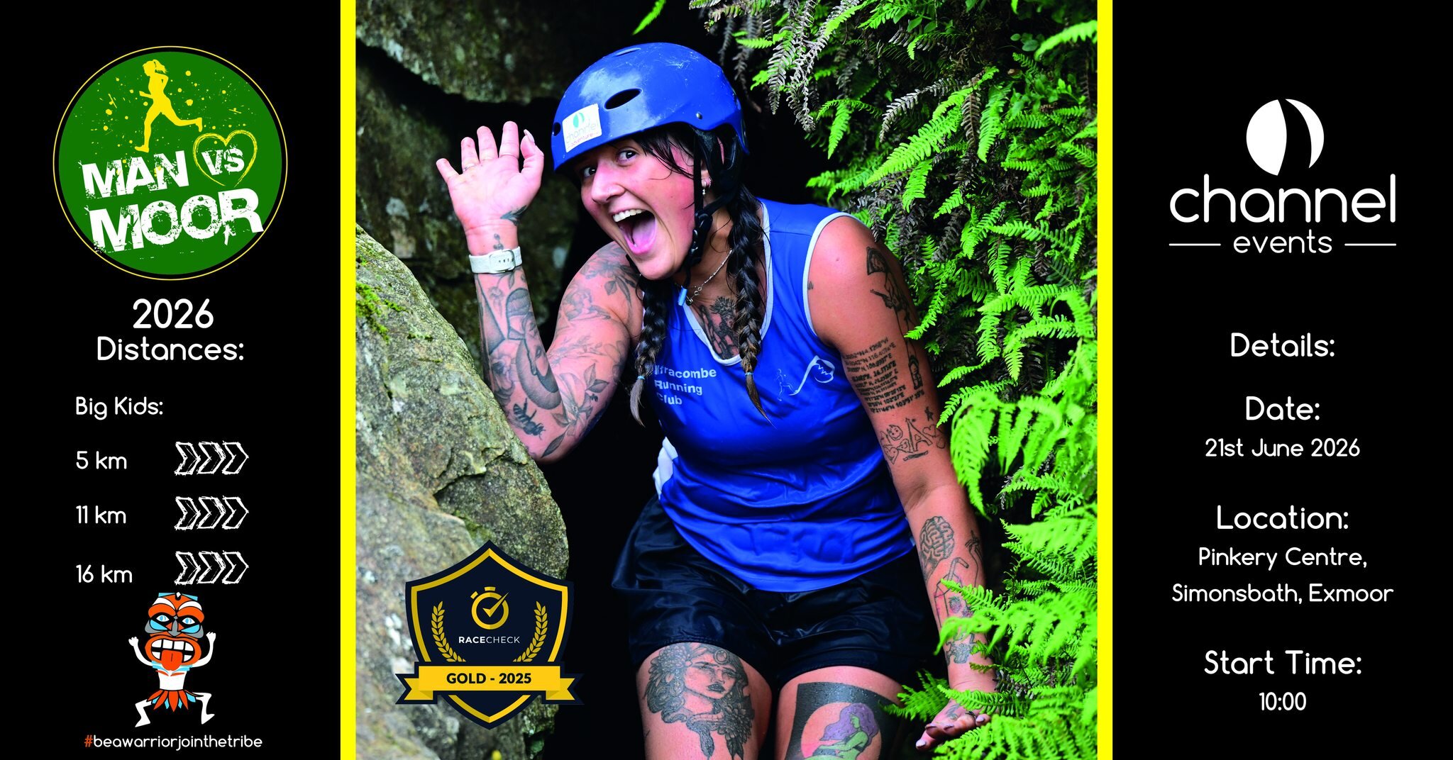 Active woman in blue sportswear, helmet, and tattoos, climbing on rocks among vibrant green ferns in Exmoor.
