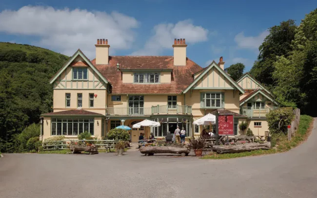 The Hunters Inn a charming hotel in Lynton with outdoor seating and scenic surroundings.