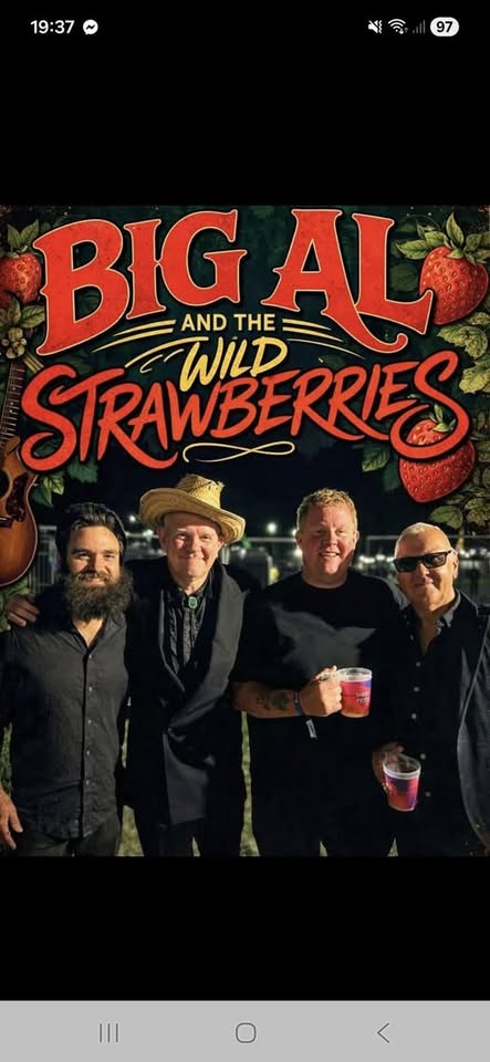 Group of four men enjoying drinks at a music event in Lynmouth, Exmoor.